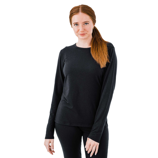 Women's thermal fleece shirt in black from Polarmax, designed for warmth and comfort in cold weather
