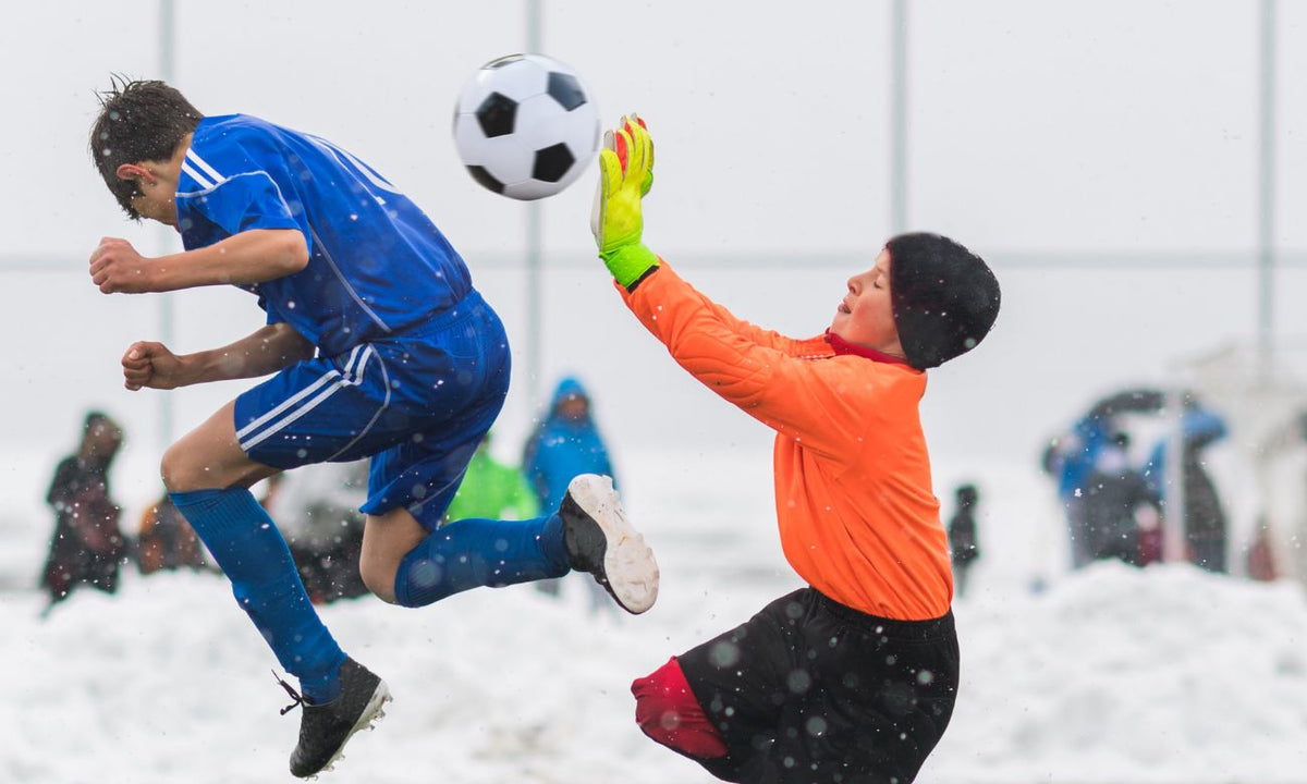 How to keep kids warm during winter sports with proper clothing and accessories while watching soccer under snowy conditions