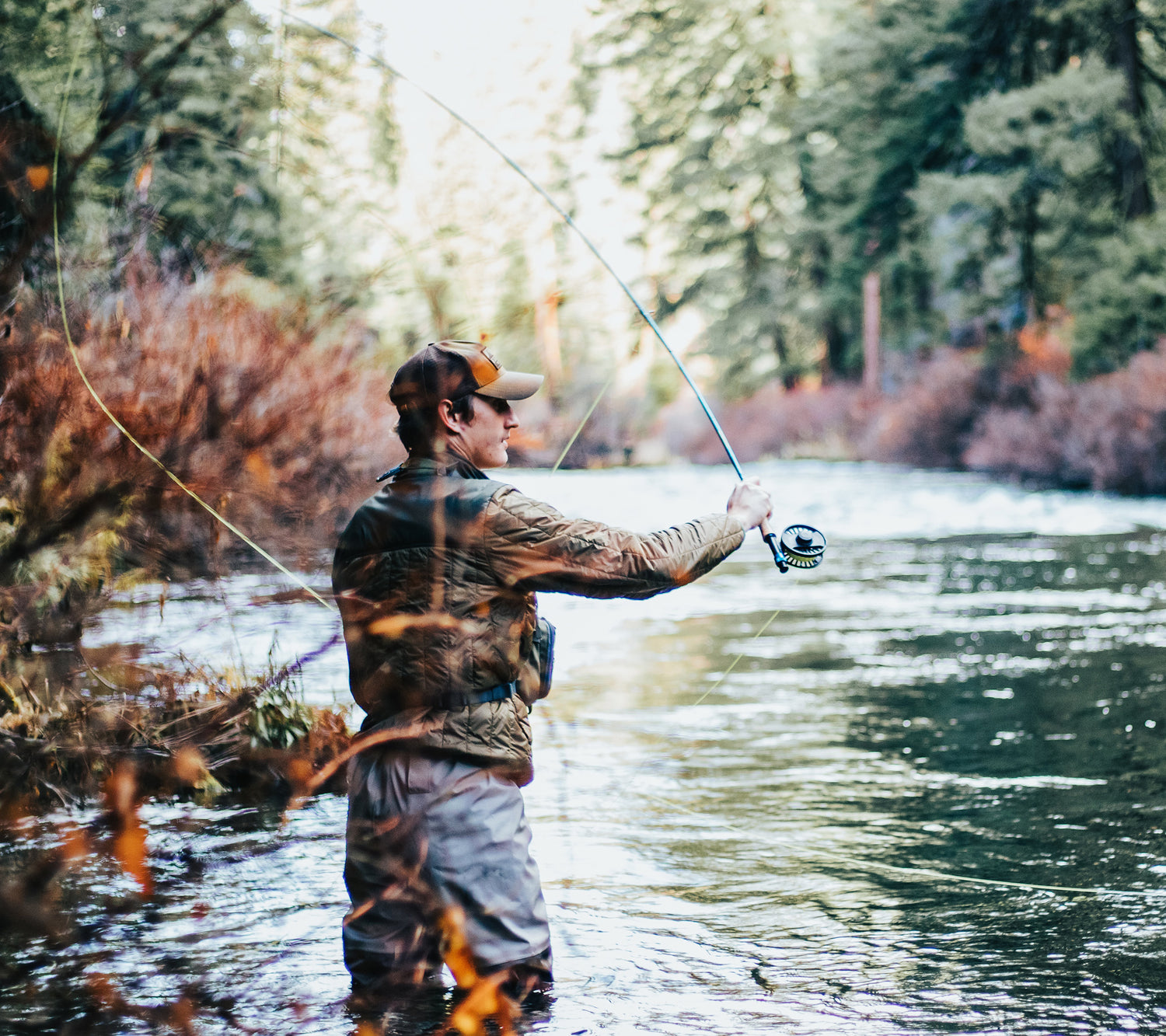 Image by Greysen Johnson on UnSplash - Man fishing in a river