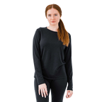 Model wearing a lightweight merino wool top in black, perfect for cold weather as a base layer for warmth and comfort