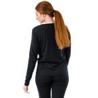 Back view of a lightweight merino wool top in black, ideal for cold weather layering and warmth.